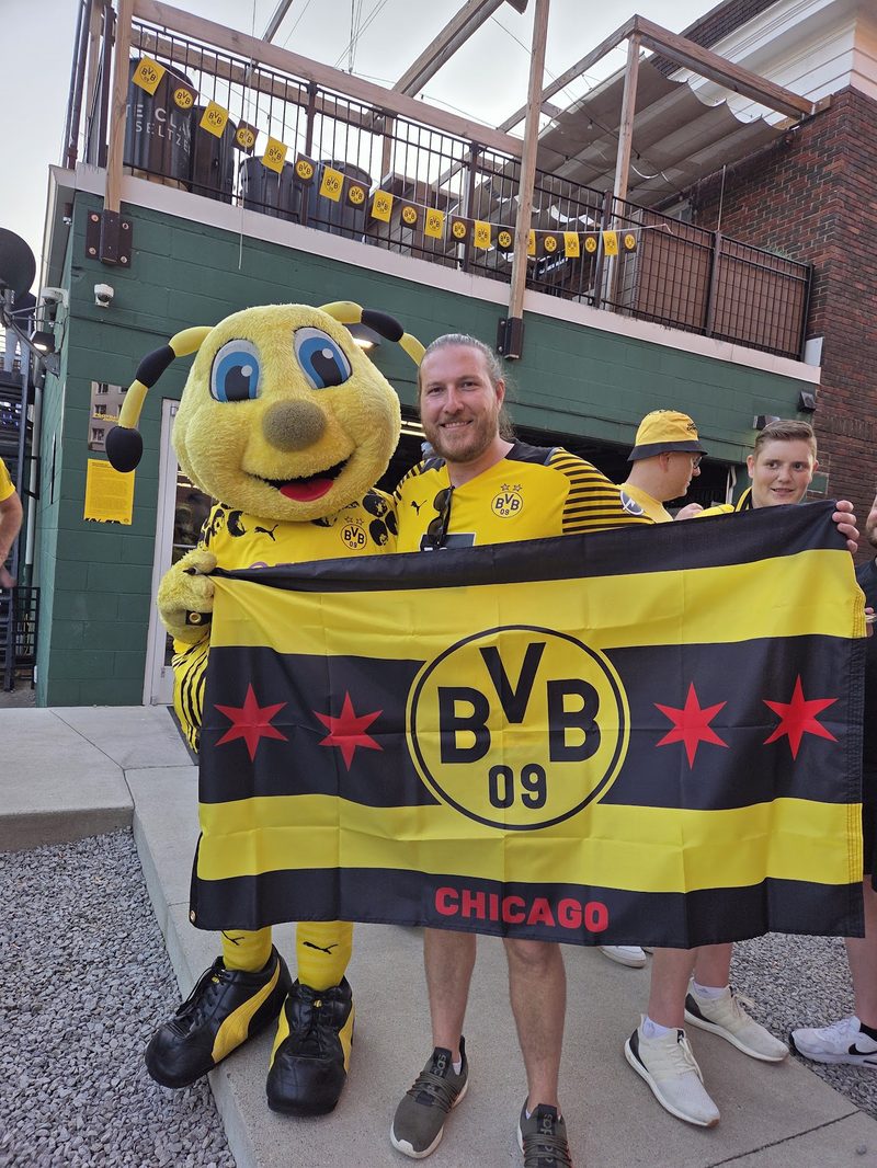 EMMA with the club's Chicago flag