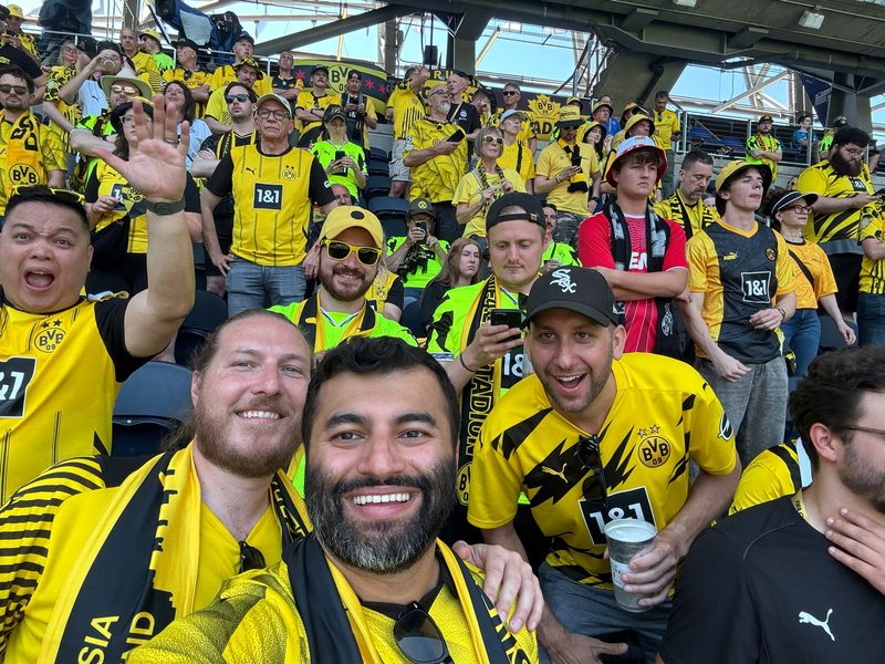 Away day crowd, all in yellow